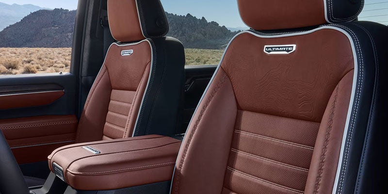 GMC Sierra 2500 HD cabin with comfortable seating and storage